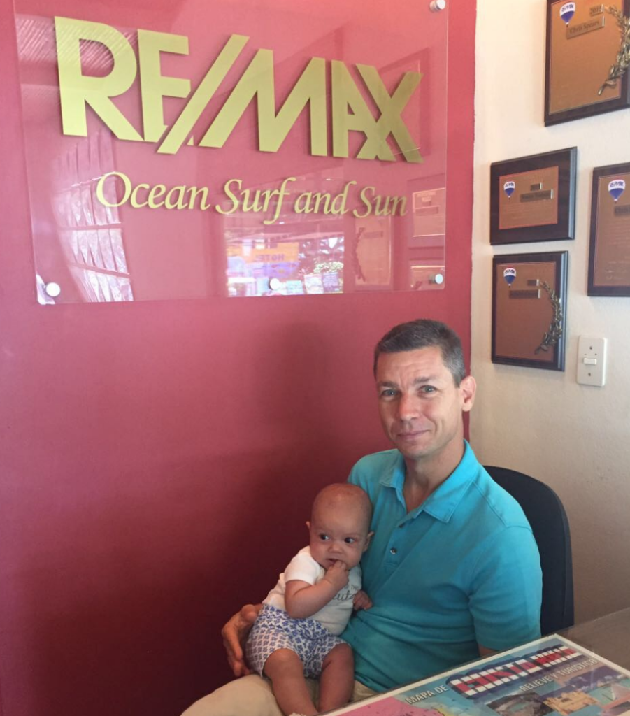 Holding his newborn baby in Costa Rica