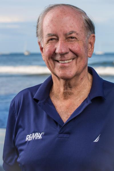 CHRIS SIMMONS, RE/MAX Ocean Surf & Sun