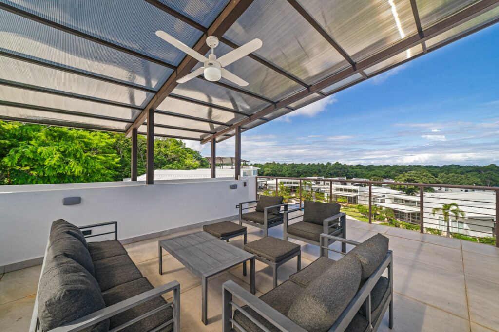PRICE REDUCTION AND OWNER’S FINANCING OFFERED FOR 10 YEARS! The Enclave B6 ~ Luxury Five Bedroom Home with Rooftop Terrace