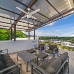 PRICE REDUCTION AND OWNER’S FINANCING OFFERED FOR 10 YEARS! The Enclave B6 ~ Luxury Five Bedroom Home with Rooftop Terrace